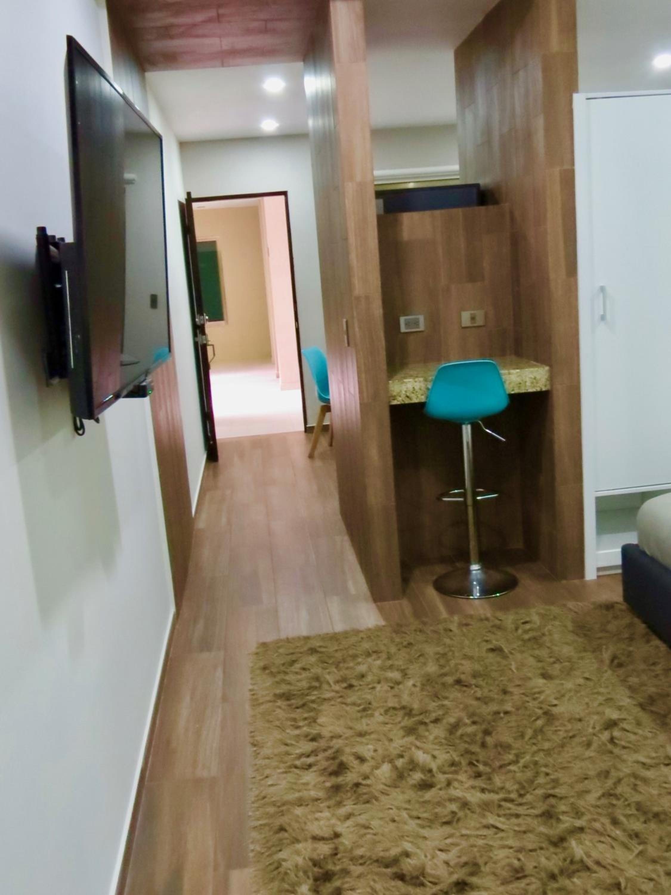 Foto de Palmarena Rooms & Residences - Long Stay Comfort with Parking, Sauna, Gym & Pool - Steps from 5th Avenue
