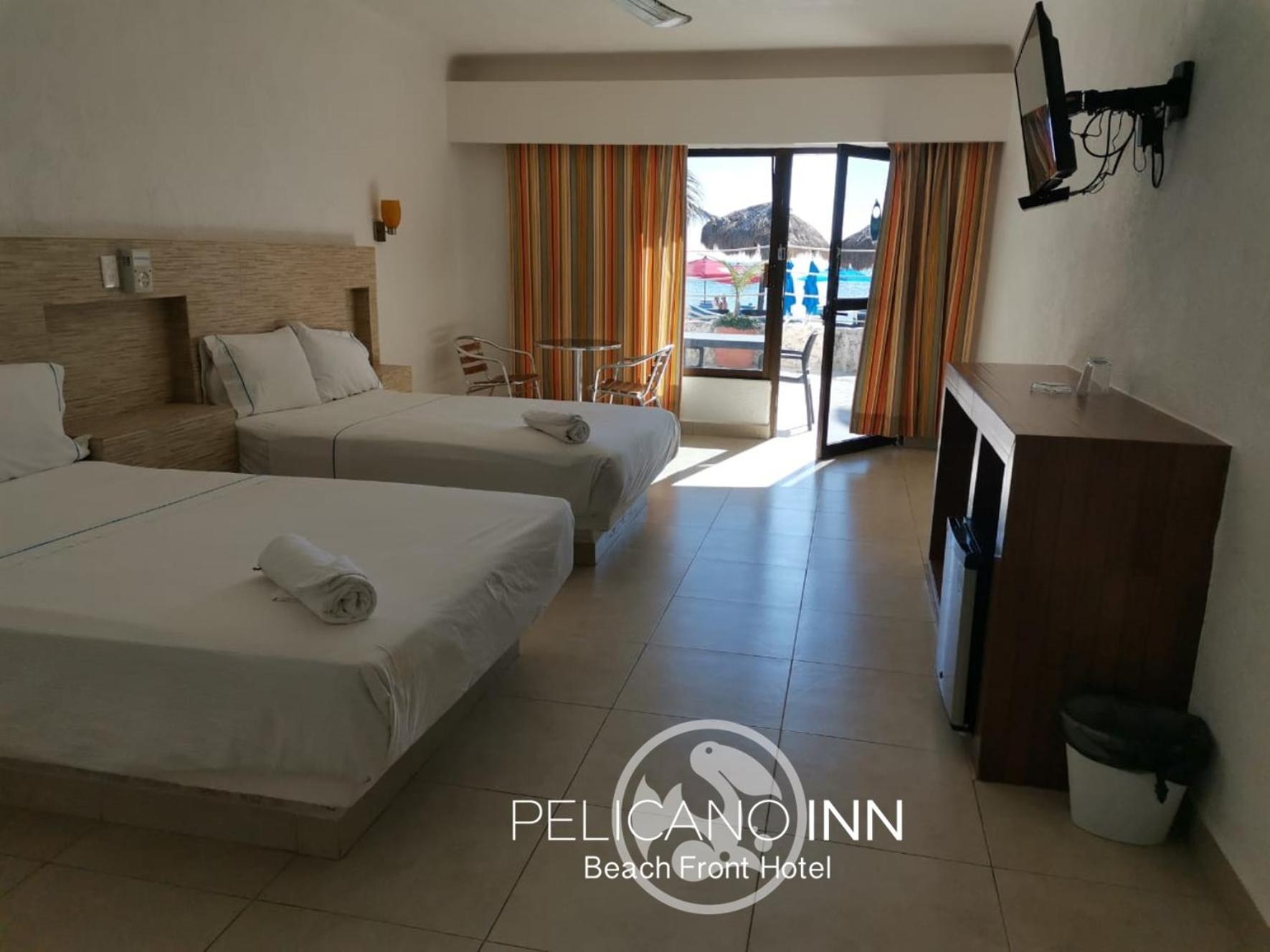 Foto de Pelicano Inn Playa del Carmen - Beachfront Hotel