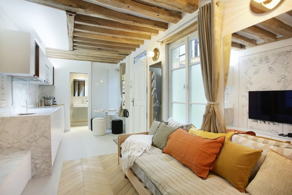 Foto de Superb Apartment Place des Vosges Le Marais